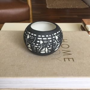 small candle holder cat detail